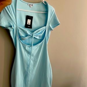 Blue mini dress from fashion nova never been worn .